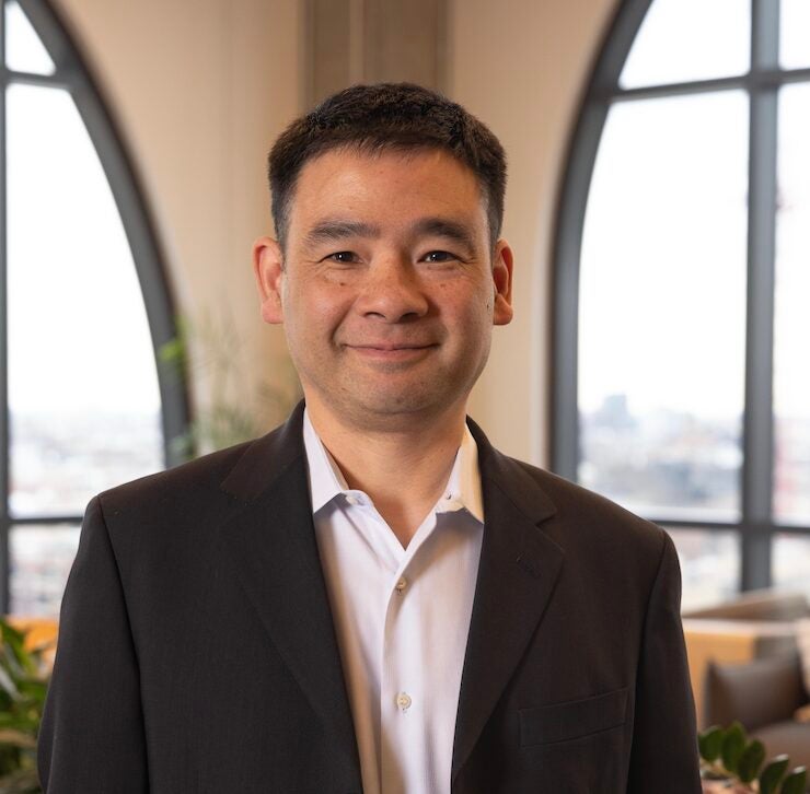 Headshot of Didier Le Tien